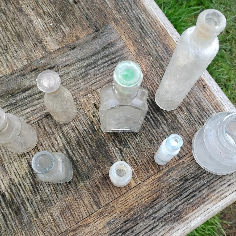 Collection of 8 vintage antique bottles